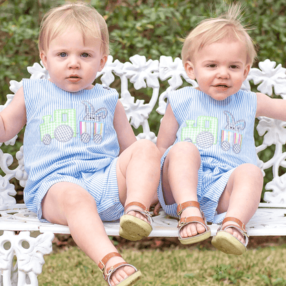 Children wearing blue and white striped shortail with green train on front-Winchester Creek Farm