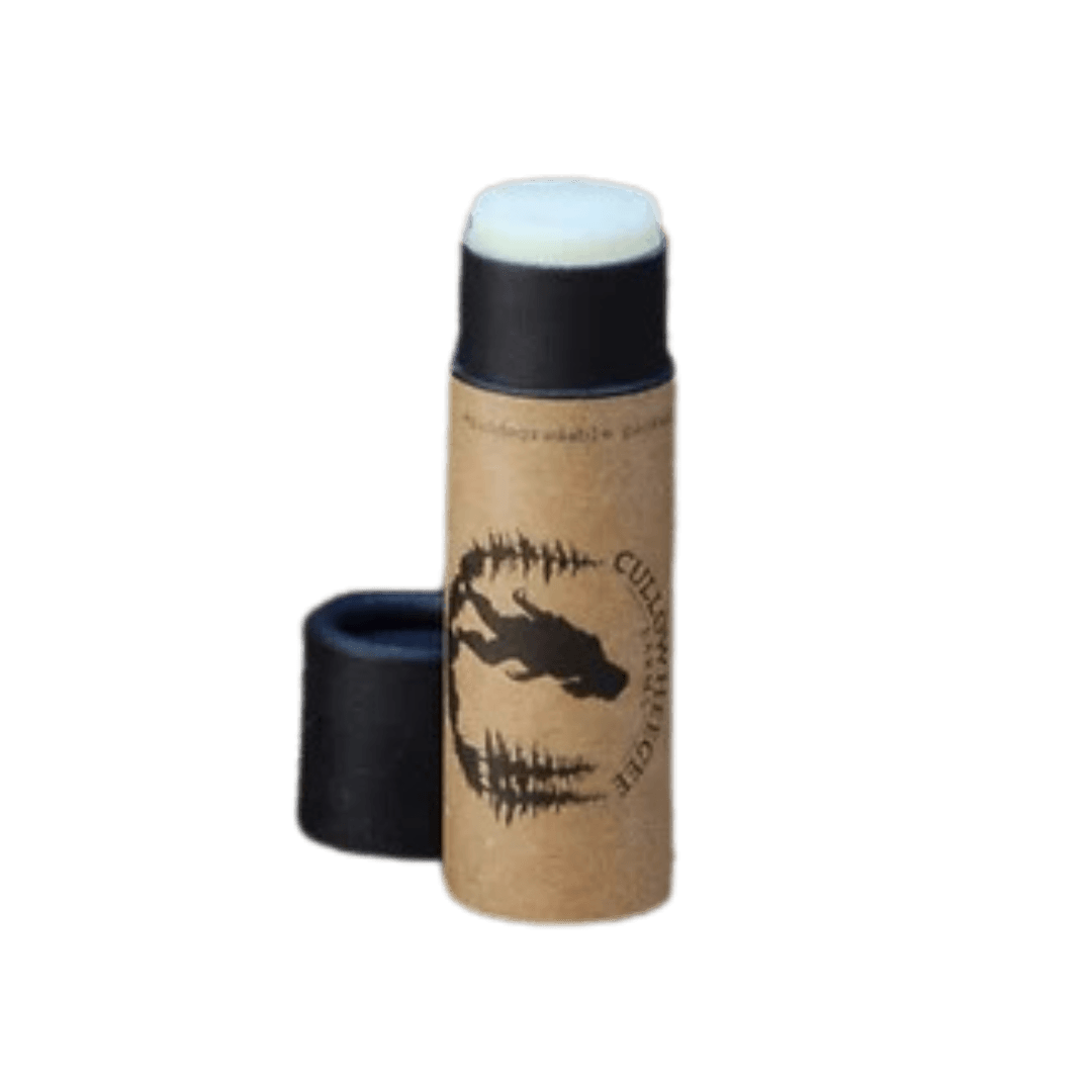 Black tube of lip balm with brown label-Winchester Creek Farm